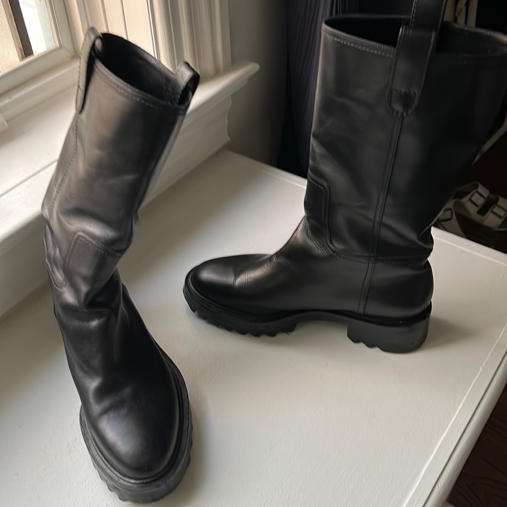 Tamara Mellon black leather pull on boots.